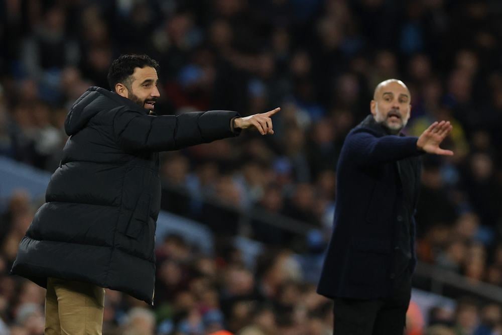 Manajer Manchester United, Ruben Amorim dan Manajer Manchester City, Pep Guardiola / REUTERS-Phil Noble