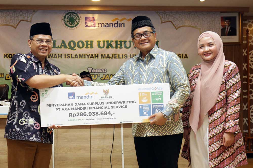  AXA Mandiri Salurkan Surplus Underwriting 2023