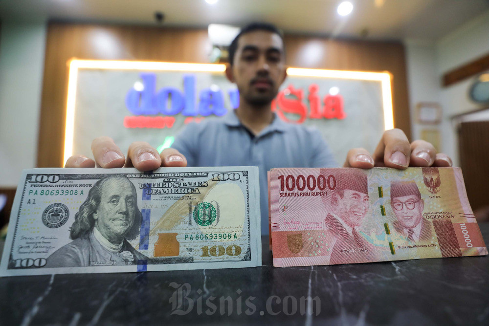  Rupiah Dibuka Lesu Usai BI dan The Fed Tahan Suku Bunga Acuan
