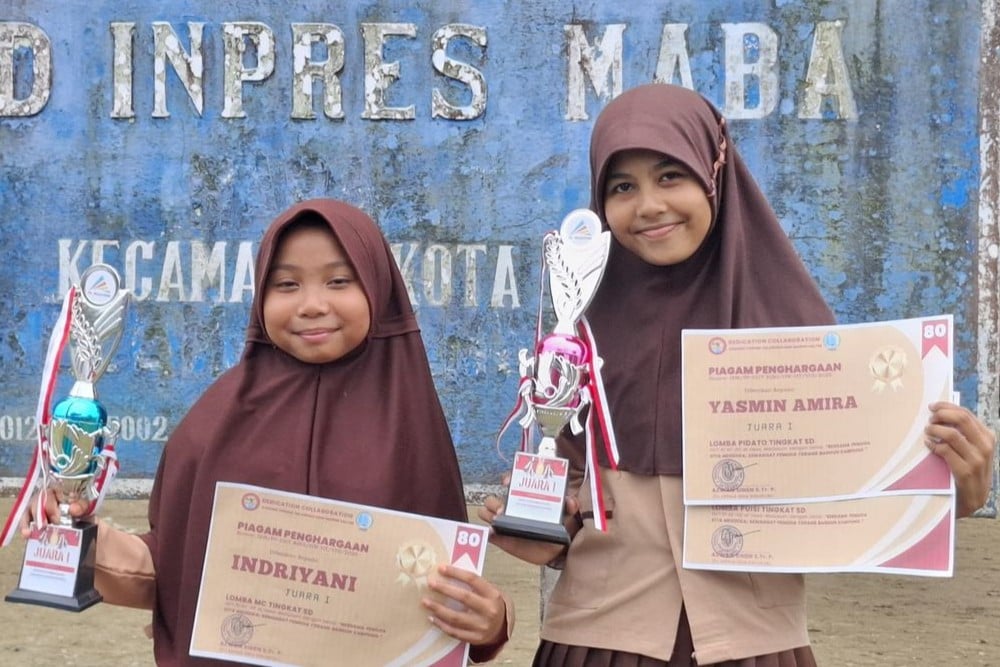 Anak-anak peserta program Pos Pintar pengembangan Bahasa Inggris di Desa Tambang, Halmahera Timur./Istimewa
