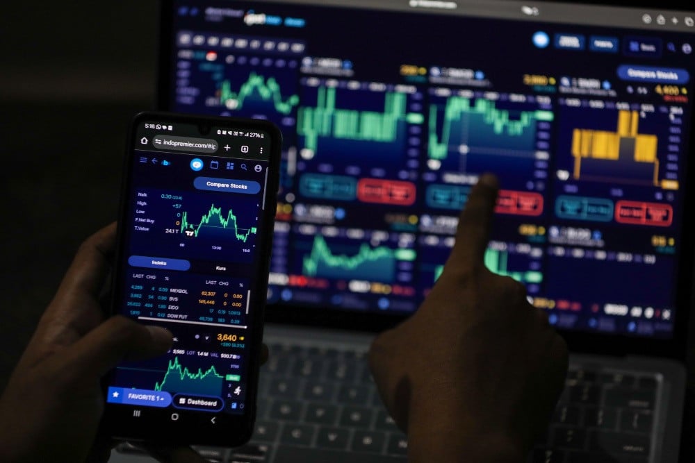 IHSG Diproyeksi Konsolidasi, Cek Saham PANI, EMTK, hingga ADRO