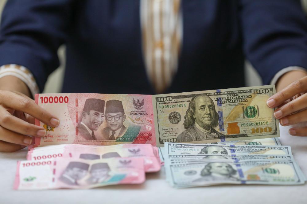 Rupiah Dibuka Melemah Sentuh Rp18.066 per Dolar AS Hari ini (9/7)