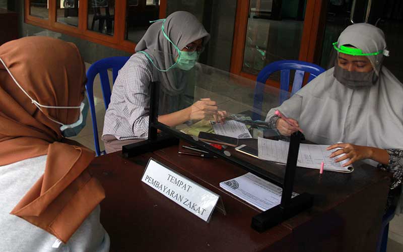 BERITA FOTO : Mengejar Sepuluh Hari Terakhir Ramadan saat Pandemi Covid-19