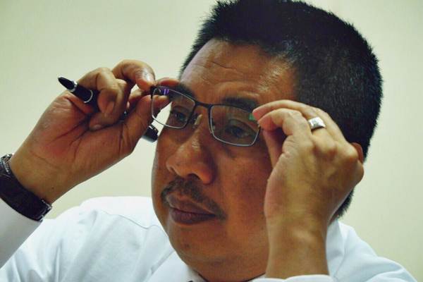 Presiden Direktur PT Surveyor Indonesia (Persero) M. Arif Zainuddin memberikan paparan saat mengunjungi kantor redaksi Harian Bisnis Indonesia, di Jakarta, Selasa (13/2). PT Surveyor Indonesia tahun ini akan membuka cabang di Malaysia, setelah kantor perwakilan yang ada di Singapura mencetak kinerja yang positif.  JIBI/Bisnis/Nurul Hidayat