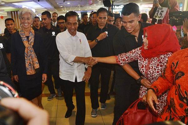 Presiden Jokowi Ajak Christine Lagarde Blusukan ke Pasar Tanah Abang