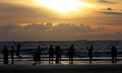 Menikmati Suasana Matahari Terbenam di Pantai Kuta
