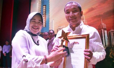 Bisnis Indonesia Raih Penghargaan Anugerah Serah Tertib Undang-Undang Deposit