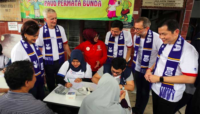 AXA BANTU KORBAN BANJIR 