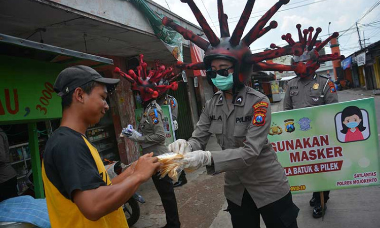 SOSIALISASI PENGGUNAAN MASKER
