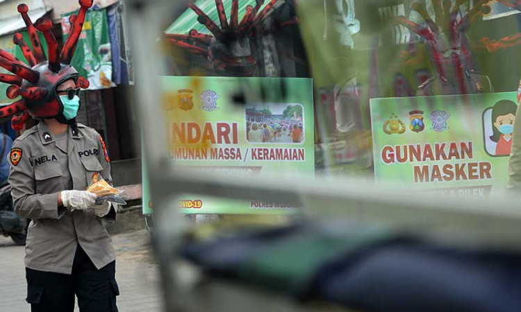 SOSIALISASI PENGGUNAAN MASKER