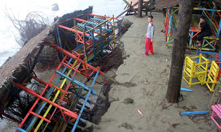 ABRASI PANTAI SUAK RIBE