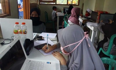 Pos Kamling Digital di Malang Dijadikan Tempat Belajar Siswa Karena Ada Wifi Gratis