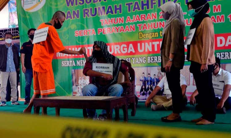 Rekonstruksi Penikaman Syekh Ali Jaber di Masjid alahudin Bandar Lampung Dikawal Ketat Polisi