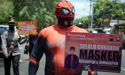 Polisi di Solo Gunakan Kostum Spiderman saat Sosialisasikan Protokol Kesehatan