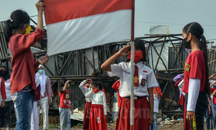 Komunitas Kelas Jurnalis Cilik Gelar Upacara Bendera di Cilincing