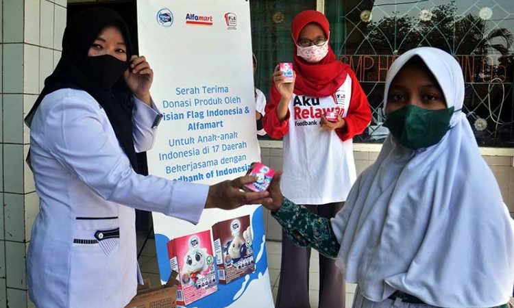 Frisian Flag Indonesia Bersma Alfamart Donasikan 100 Ribu Kotak Susu Cair Anak