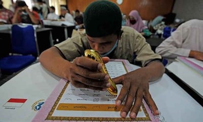 Penyandang Disabilitas Membaca Al Quran Huruf Braille Digital di Jambi