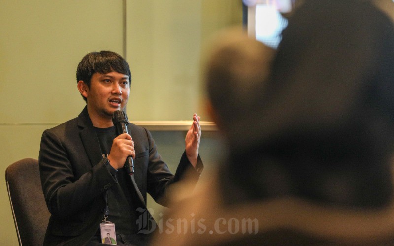 Chief Technology Officer Qiscus Evan Purnama memberikan pemaparan saat konfrensi tahunan Conversa 2.0 di Jakarta, Rabu (31/8/2022). Bisnis/Suselo Jati