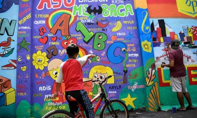 Mural di Kampung Literasi Palmeriam dan Bale Buku Jakarta