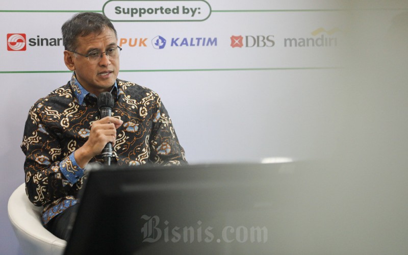Direktur Utama PT Pupuk Kalimantan Timur Rahmad Pribadi memberikan paparan saat mengikuti diskusi panel Bisnis Indonesia Green Economy Forum 2023 hari kedua di Jakarta, Rabu (7/6/2023). Bisnis/Arief Hermawan P