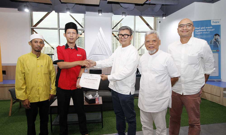 AFPI Klaster Syariah Berikan Santunan Kepada Anak Yatim Saat Acara Lentera Kasih Ramadan