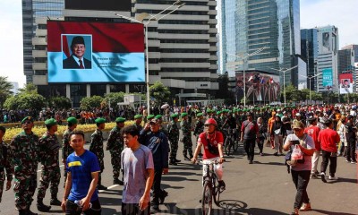 Warga Mulai Padari Jalan Jendral Sudirman Jelang Pelantikan Presiden Terpilih Prabowo Subianto