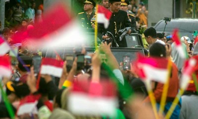 Presiden Ke-7 Joko Widodo Disambut Ribuan Warga Ketika Tiba di Solo