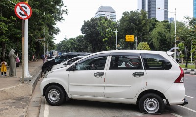 Pengempisan Ban Kendaraan Karena Melanggar Aturan Parkir