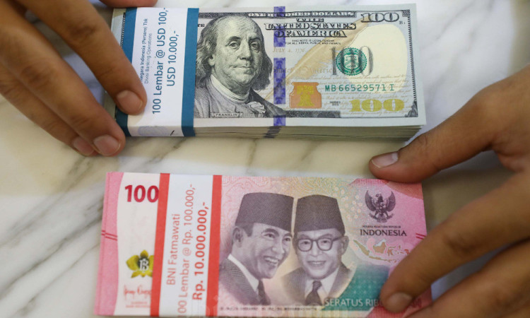 Rupiah Dibuka Melemah 0,02% ke Rp16.312 Per Dolar AS
