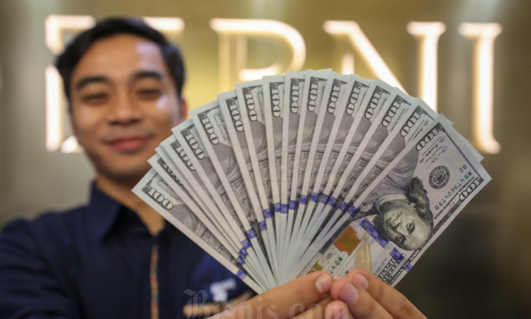 Rupiah Dibuka Melemah 0,02% ke Rp16.312 Per Dolar AS