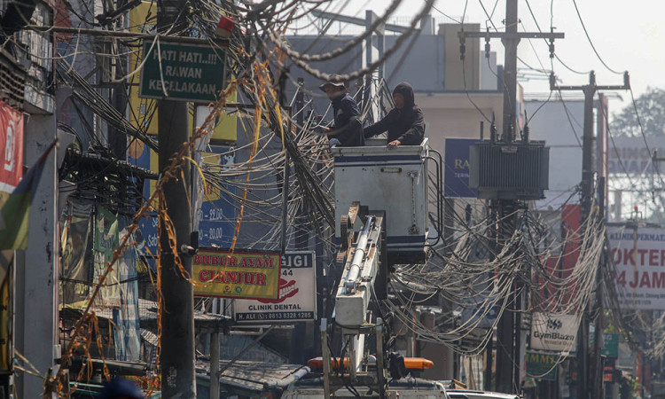 Pemkab Bogor dan APJATEL Tata 18 Km Kabel Udara di Jalan Raya Bogor-Jakarta
