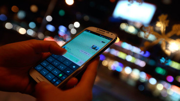 Samsung Turun Laba di Tengah Serangan Apple
