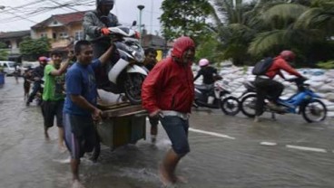 Kadin DKI Rame-Rame Bantu Korban Banjir