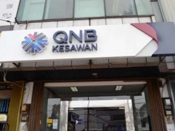 Biaya Operasional Bank QNB Kesawan Masih Tinggi