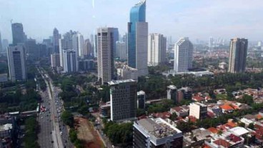 Survei Fitch Jelang Pemilu: Pebisnis Optimistis, Perbankan Sebaliknya