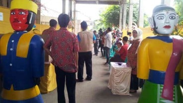 PILEG 2014: Tarik Minat Pemilih, TPS Ini Suguhkan Ornamen Budaya Betawi