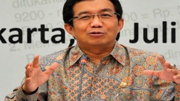 PILEG 2014: Ketua OJK Muliaman D. Hadad Nyoblos di TPS 19 Benhil