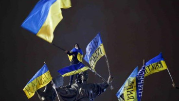KRISIS UKRAINA: IMF Tingkatkan Bantuan, Putin Minta Pasukan Ukraina Mundur