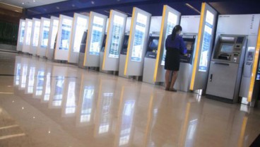 KEAMANAN ATM: Chip Lebih Aman Dibandingkan Pita Magnetik