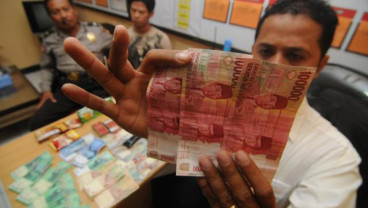 PEREDARAN UANG PALSU: Bank Indonesia Klaim Rasio Membaik