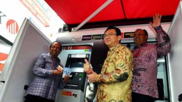 PENGADAAN ATM BANK DKI, Proyek Disetop Karena Tak Efisien