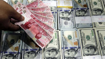 KURS TENGAH BI: Menguat ke Rp12.193/US$ Di Awal Pekan