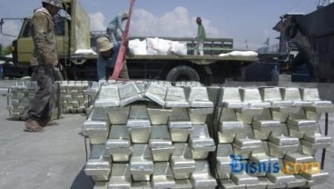 HARGA KOMODITAS: Short-Covering Akhir 2014 Angkat Timah