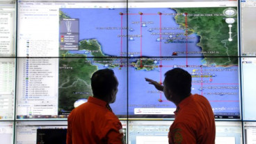 Bisnis Indonesia Edisi Kaleidoskop 2014: Seksi Utama, Pencarian AirAsia QZ8501
