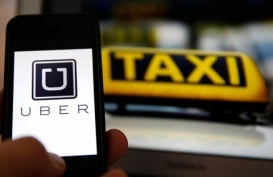 Prancis Larang Layanan Taksi Online Uber