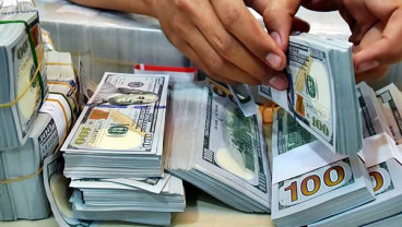 DOLAR AS: Reformasi Pajak Trump Masih Kuatkan Indeks