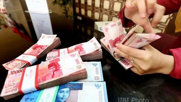 Jisdor Terdepresiasi ke 13.347, Spot Rupiah Masih Tertekan Laju Dolar AS