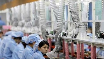 EKONOMI CHINA: Komoditas Naik, Inflasi Produsen Melesat