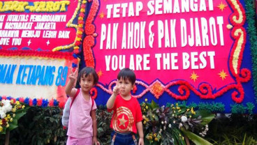 Aksi Buruh dan Wisata Bunga Ahok