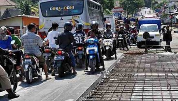 INFRASTRUKTUR JALAN : Trans-Sulawesi Mulus pada 2019